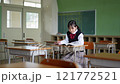 Female junior high school student studying in the classroom 121772521