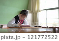 Female junior high school student studying in the classroom 121772522