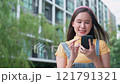 Asian women overjoyed and excited celebrating good news watching smartphones to win the prize and lottery, Young entrepreneurs celebrate business triumphs success, online lifestyle, and social media 121791321