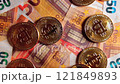 Bitcoin Coins on the 50 Euro Banknotes - Top View 121849893