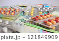Colored Pills, Tablets and Capsules with Syringes on the Different Euro Banknotes 121849909