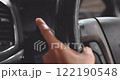 Footage Close up, Woman uses her finger to turn on car's turn signal to signal left turn on the road. VDO 4K resolution. concept of Vehicles, Travel, Safety, and Driving. 122190548