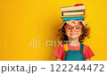 Girl with Books on Head 122244472
