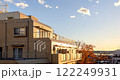 A golden Tokyo Timelapse contrasts with red autumn foliage and urban life, Japan 122249931