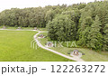 Aerial view of a pilgrimage trail with chapels and lush greenery 122263272