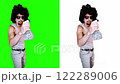 Man moisturizing plants splashing water on green background 122289006