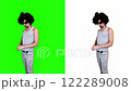 Man warming up on a green background 122289008