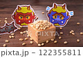 Setsubun, demon mask and beans in a wooden box 122355811