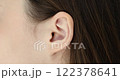 Closeup of woman face and ear concept 122378641