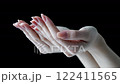Scooping up with the palm of your hand 122411565