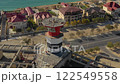AKTAU, KAZAKHSTAN - FEBRUARY 1, 2025: Construction progress of a modern lighthouse in coastal Akatau 122549558