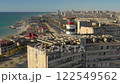 AKTAU, KAZAKHSTAN - FEBRUARY 1, 2025: Stunning aerial view of coastal landscape with modern buildings and serene sea 122549562