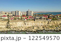 AKTAU, KAZAKHSTAN - FEBRUARY 1, 2025: Aerial view of Akatau cliffside homes and the Caspian Sea along the coastline showcasing modern architecture 122549570