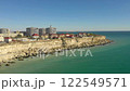 AKTAU, KAZAKHSTAN - FEBRUARY 1, 2025: Coastal view of cliffs and residential buildings by the Caspian Sea in Akatau 122549571