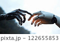 White cyborg robotic hand pointing his finger to black cyborg with stretched finger  122655853