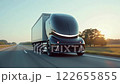 Futuristic autonomous electric truck on a future highway during the nighttime with informatiove leds lit up. 122655855