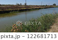 A pond on the fish farm with a working aeration system 122681713