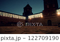 Illuminated castle walls at dusk with festive lights 122709190