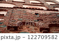Architectural details of historic brick building facade 122709582