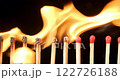 4K - Matchsticks on fire in row. Burning of matches sequence against BG 122726188