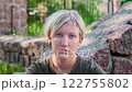 Face of sad looking pensive teenage girl suffering from depression of loneliness 122755802