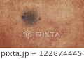 Old parchment burning through, grunge background 122874445