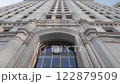 Facade of new modern multi-storey house, bottom view, close-up 122879509