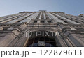 Facade of new modern multi-storey house, bottom view, close-up 122879613