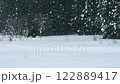 Snowy scenery of Satoyama: Snow fields and forests covered in snow, monochrome 122889417