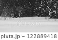 Snowy scenery of Satoyama: Snow fields and forests covered in snow, monochrome 122889418