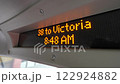A digital display inside a city bus shows the route 38 to Victoria at 8 48 AM, This technology enhances the commuting experience by offering real time updates on the route and schedule. 122924882