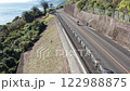 Coastal route 220 in Miyazaki Japan, Drone flight showing sea and road. 122988875