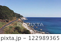 Coastal route 220 in Miyazaki Japan, Drone flight showing sea and road. 122989365