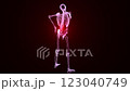 A human skeleton with lower back pain, highlighted spine vertebrae, 3D animation in colorful X-ray style on a black background. 123040749