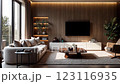 A modern living room is bathed in warm lighting, showcasing a minimalist design with a focus on natural wood textures and neutral tones, featuring a comfortable sofa and a sleek entertainment unit 123116935