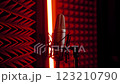 In a Recording Studio, a Microphone stands out with Ambient Lighting  123210790