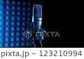 In a Recording Studio, a Microphone stands out with Ambient Lighting  123210994