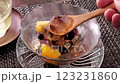 Scoop the anmitsu with a wooden spoon 123231860