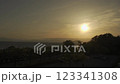 The setting sun and the silhouette of Takeo Island 123341308