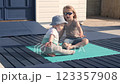 Brother and sister play near the house in the yard 123357908