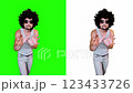 A male magician moves his hands like an asmr sorcerer on a green background 123433726