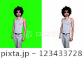 a man presses virtual buttons, turns on the light, on a green background 123433728