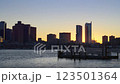 View of beautiful Boston cityscape skyline seen from Piers Park on a cold clear late winter evening 123501364