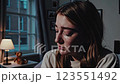 Emotional Scene of Young Woman Reflecting in Dimly Lit Room Footage 123551492