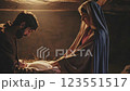 Newborn in Manger Scene Film with Parents in Soft Lighting 123551517