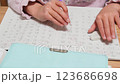 Elementary school students practicing kanji 123686698