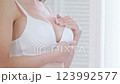 A Female Is Self Observing Breasts Pain Due To Breast Cancer, Awareness Program 123992577