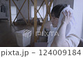 man drying his hair with a towel 124009184
