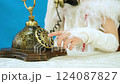 A child girl dials a number on an old rotary telephone in slow motion 124087827