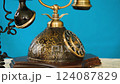 Vintage telephone on blue background 124087829